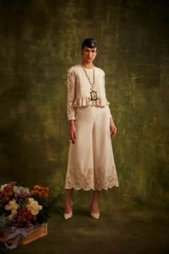 Ivory Yoke Pleated Peplum Top